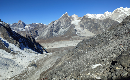 Climbers ascending Island Peak with Everest Base Camp route in the background