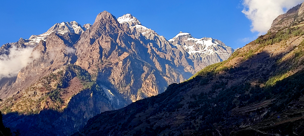 Tsum Valley trek with mountain views of Ganesh Himal and traditional Tibetan villages
